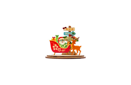 Decorative Christmas scene with Santa Claus, reindeer, and tropical elements on a white background