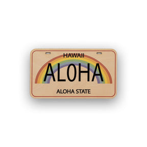 Hawaii license plate with rainbow design and 'Aloha' text on a white background
